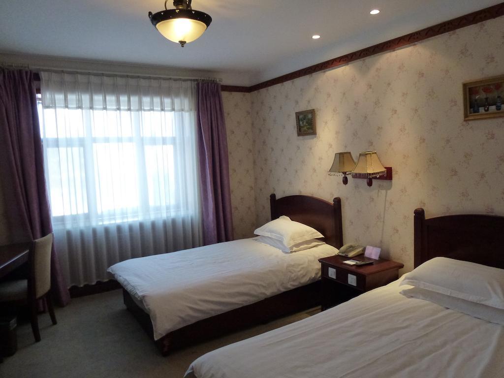 Harbin Volgamanor Hotel Acheng Quarto foto