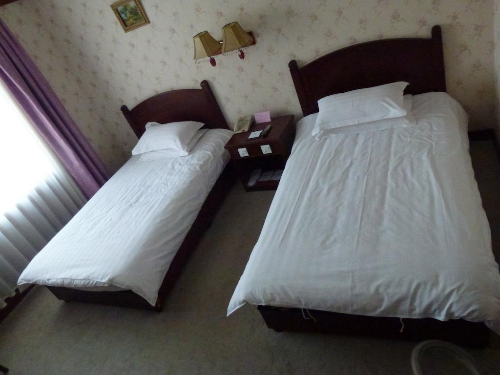 Harbin Volgamanor Hotel Acheng Quarto foto