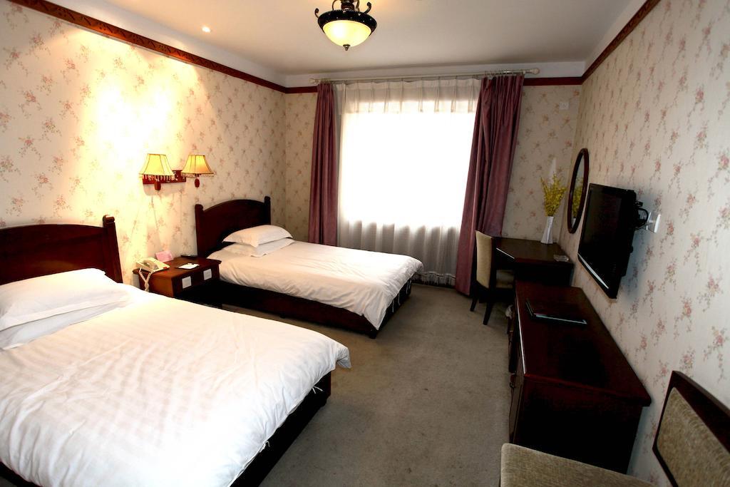 Harbin Volgamanor Hotel Acheng Quarto foto